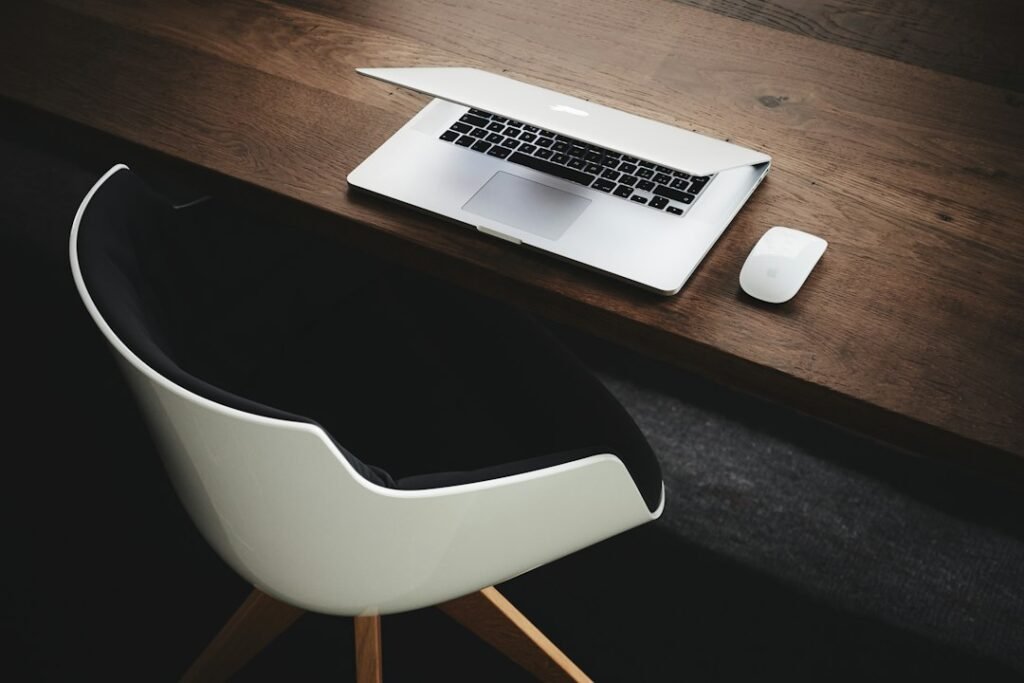 Modern laptop and office workspace for a small business website article
